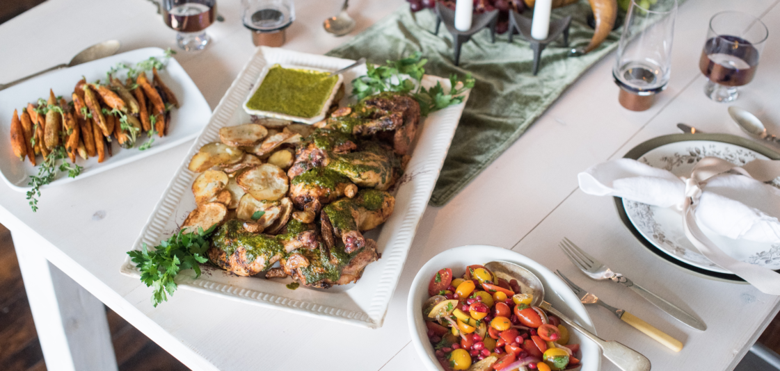 dishes of food on white table