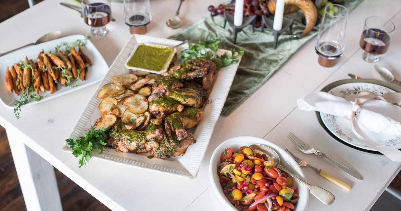 dishes of food on white table